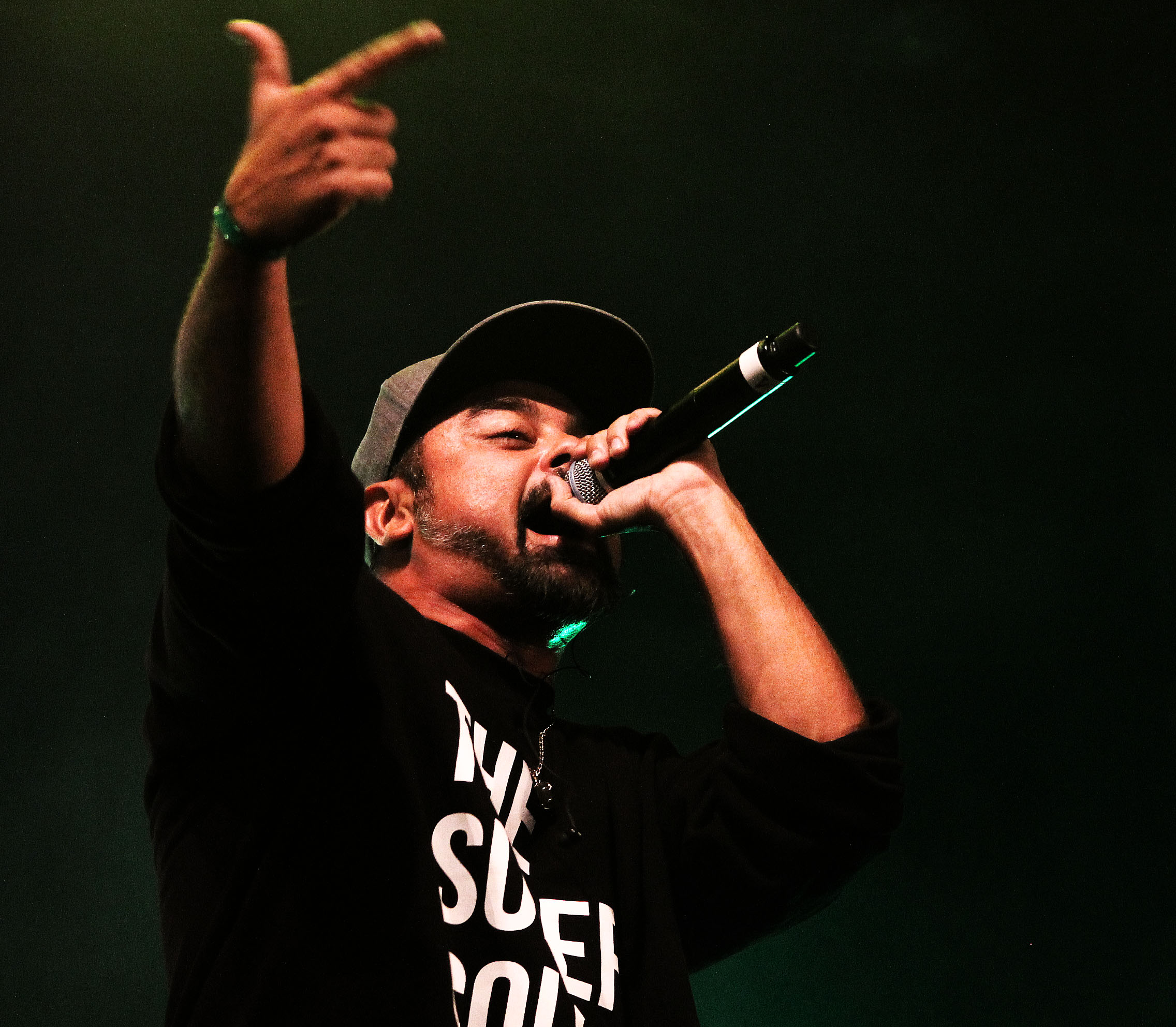 Man singing holding microphone
